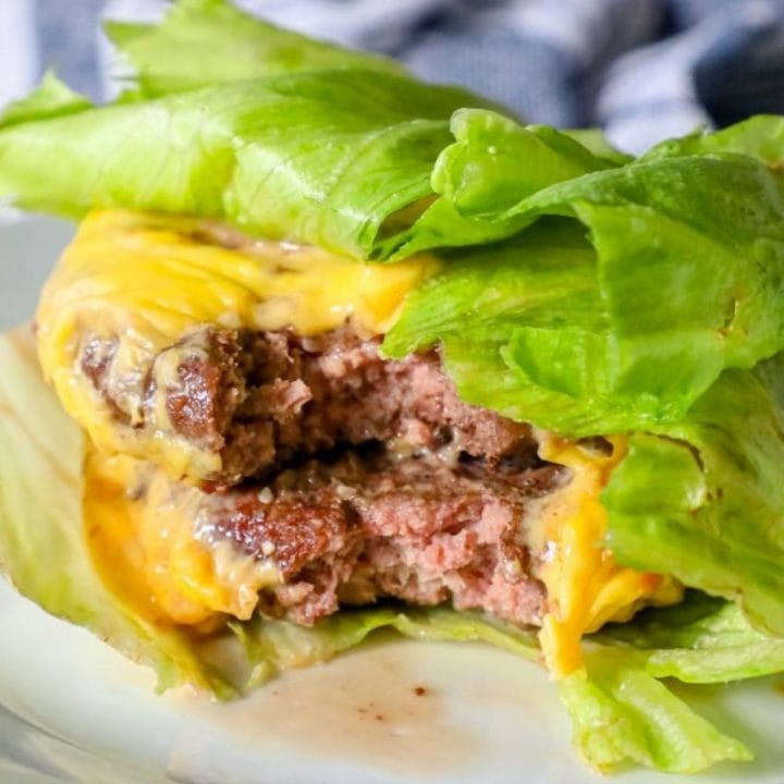 A lettuce wrap cheeseburger made in an air fryer.