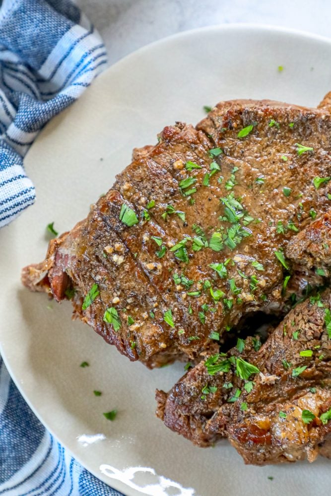 picture of pot roast on a white plate