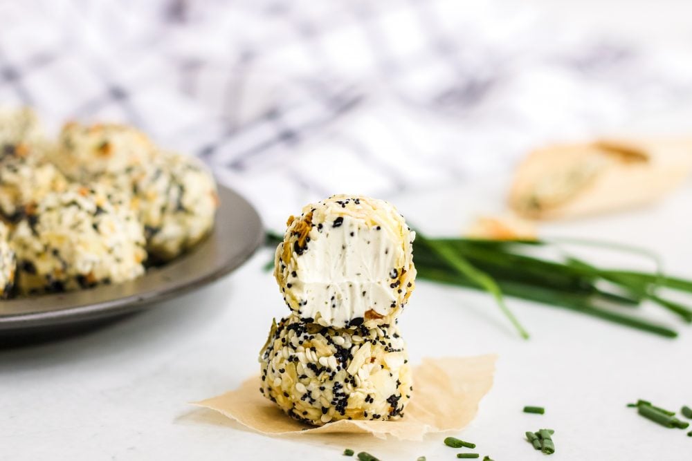 picture of fat bombs in everything bagel seasoning on a plate with chives