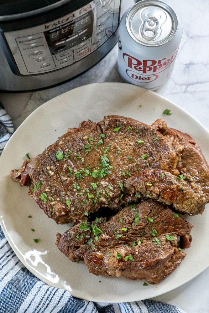 picture of pot roast on a white plate