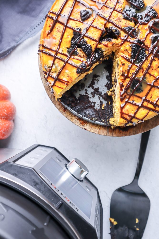  picture of a pumpkin oreo cheesecake next to an instant pot