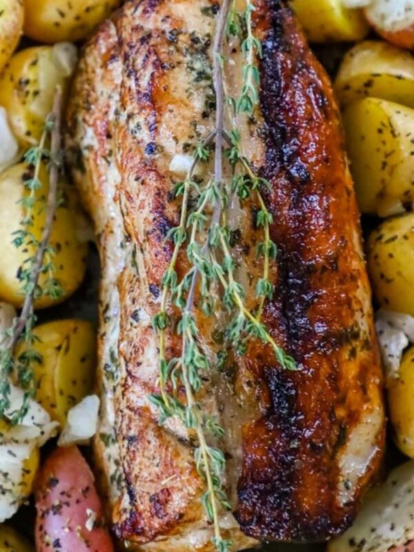 picture of roasted pork loin and potatoes in a sheet pan