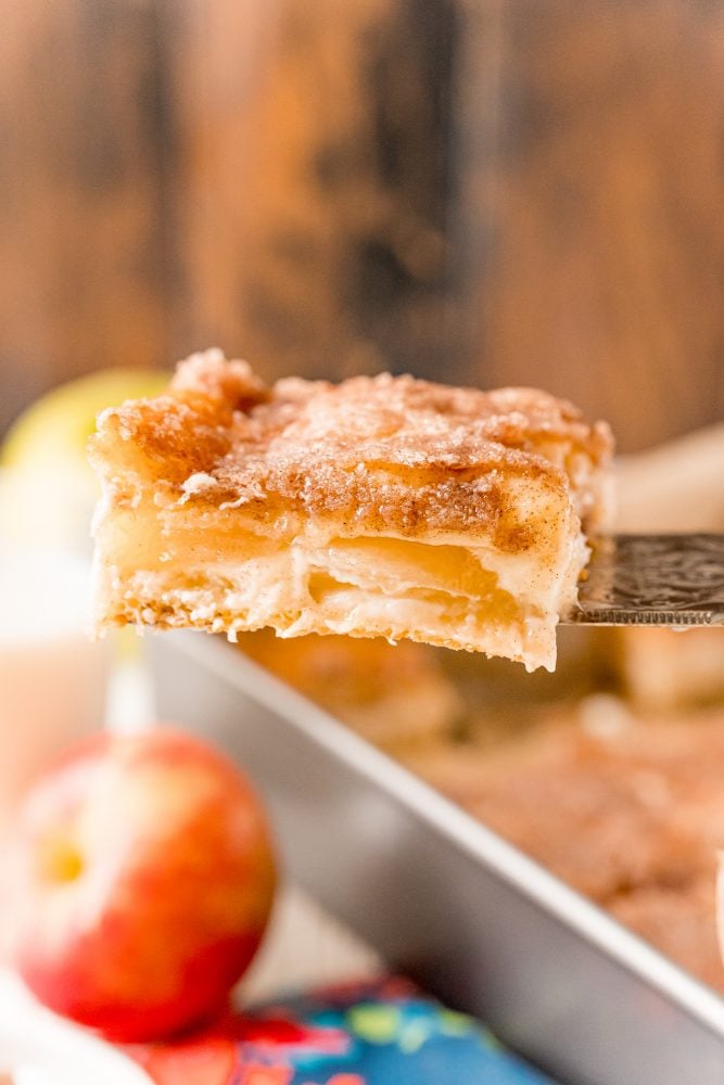 picture of baked apple sopapilla cheesecake on a fork 