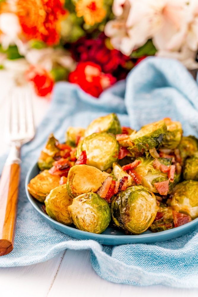 picture of brussels sprouts with bacon in a dish  