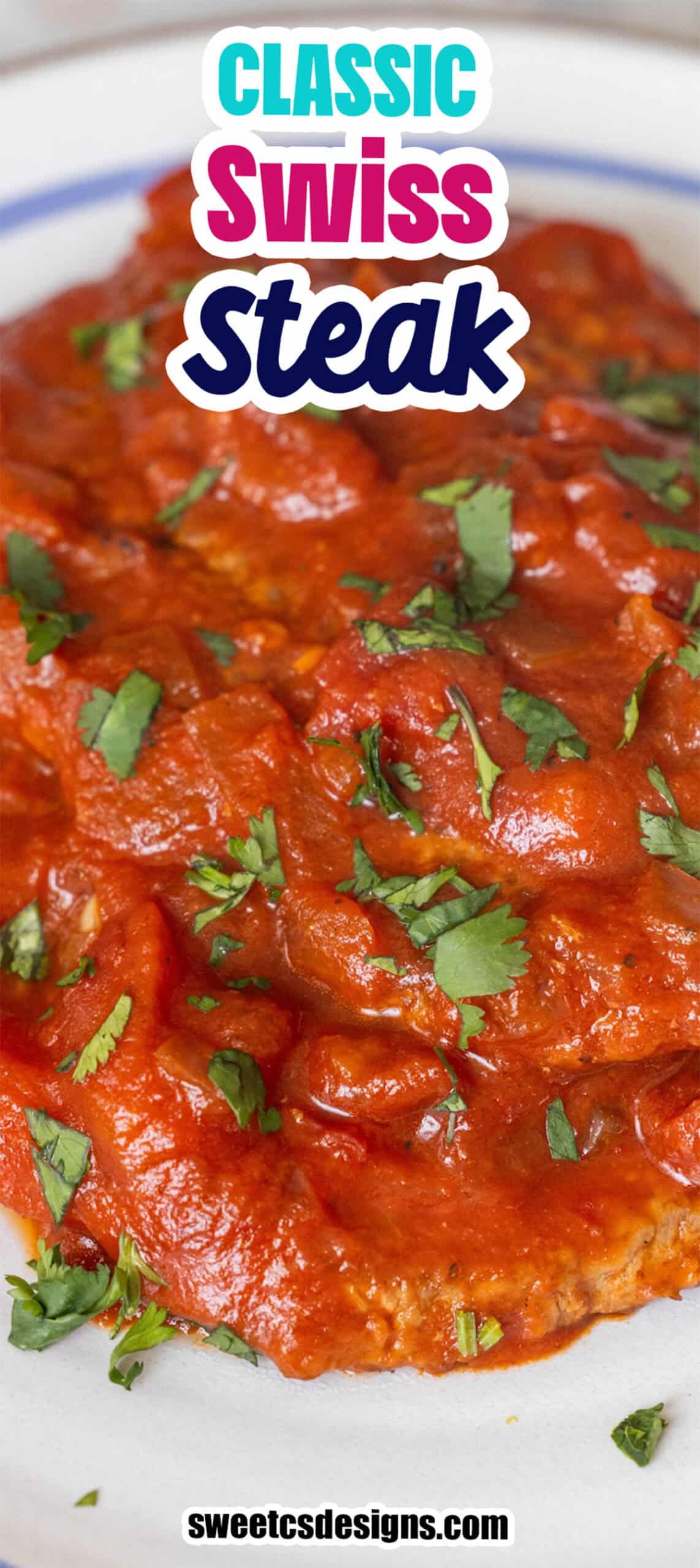 A piece of tender Swiss Steak covered in rich tomato sauce, garnished with chopped parsley, served on a white plateโan inviting presentation of classic tomato sauce braised beef.