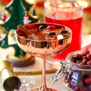 A festive Christmas cocktail featuring a cranberry-infused glass of Sangria.