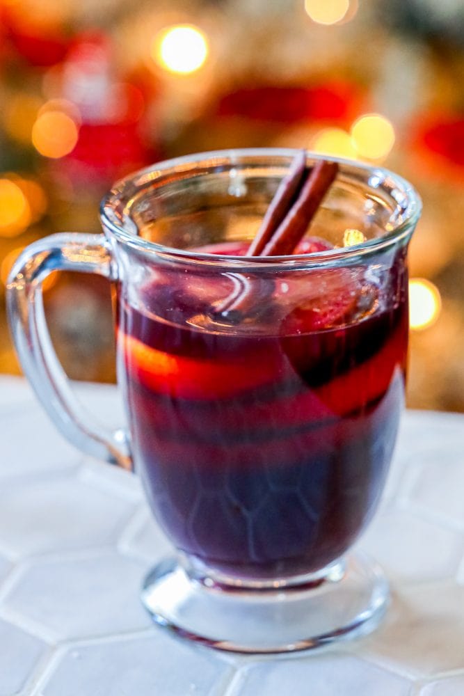 picture of rum punch in a glass mug on a table