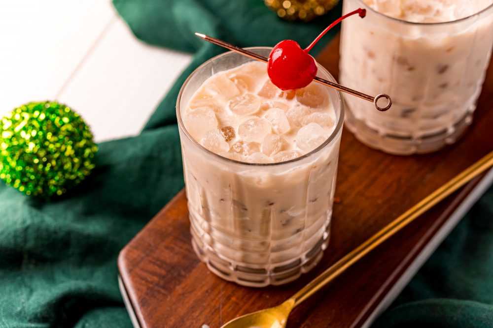 picture of a white russian in a glass with a cherry on a stick