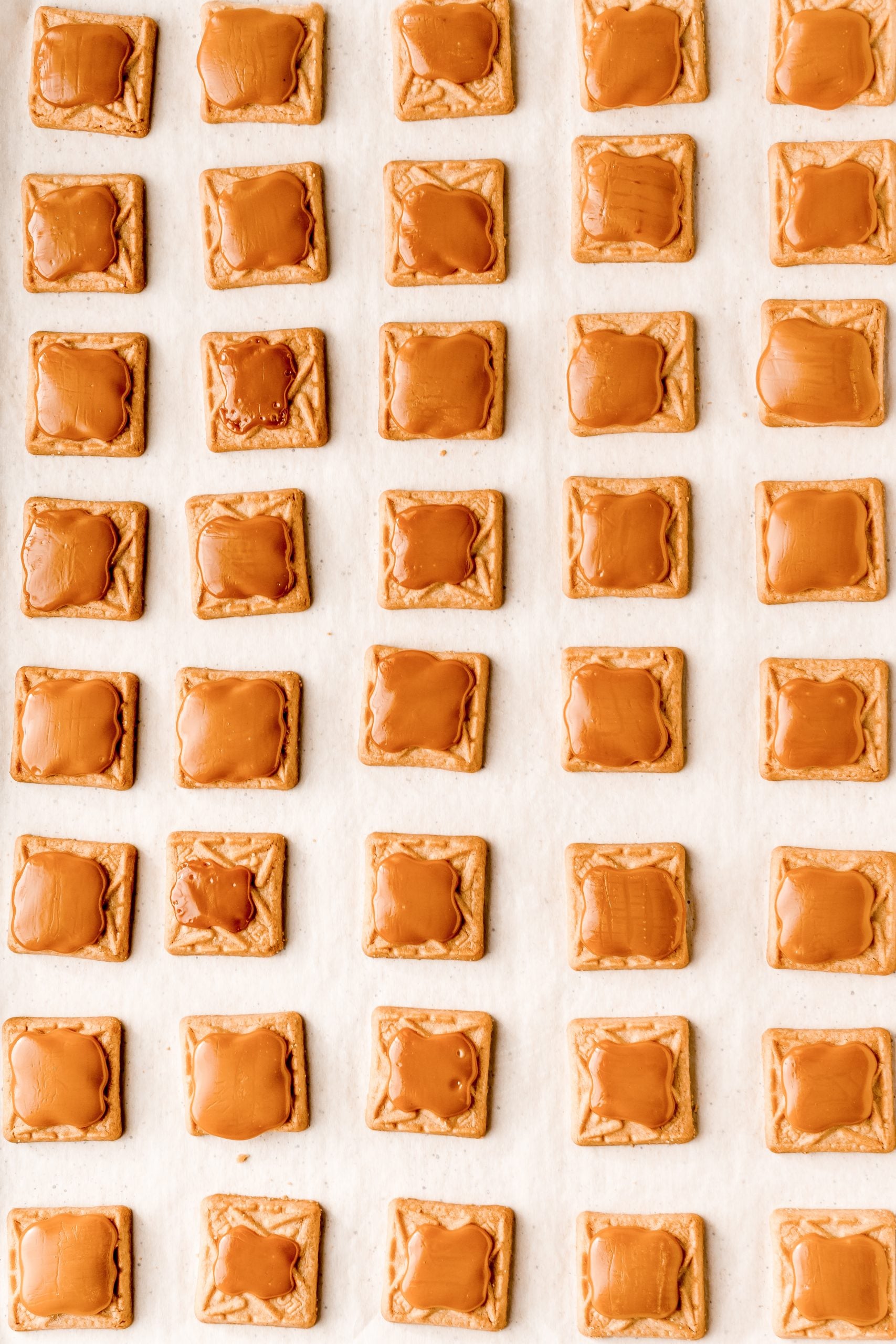 Easy millionaires bars on a baking sheet.