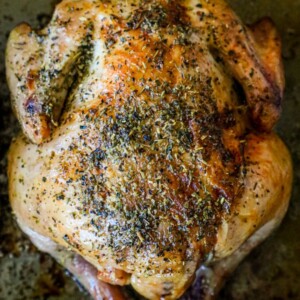 picture of a cornish game hen on a baking sheet
