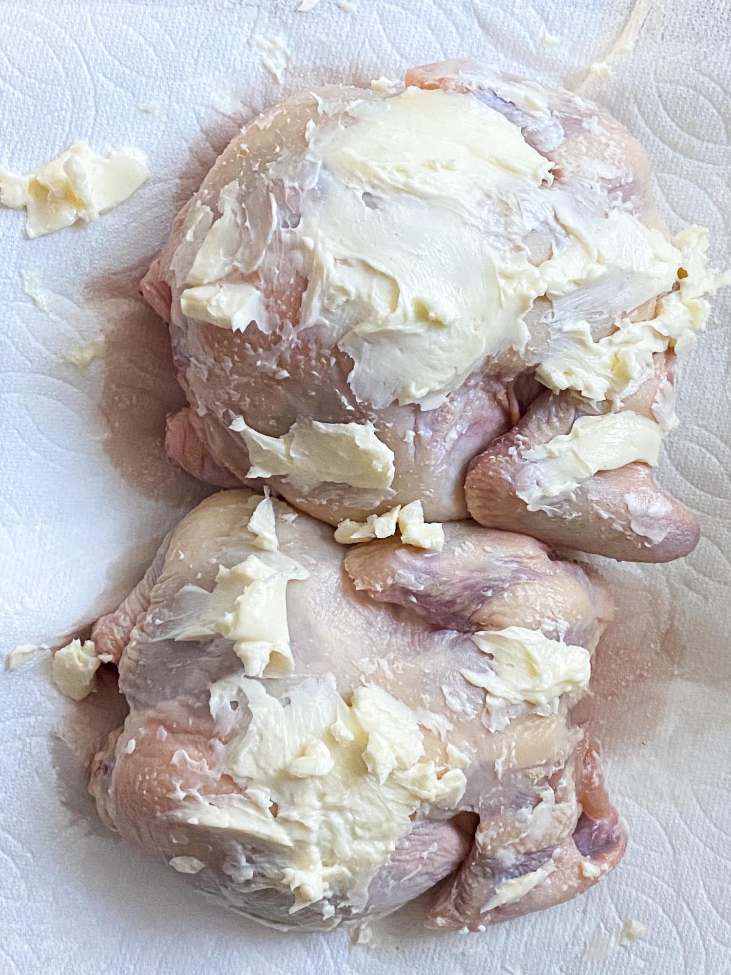 chicken covered in butter