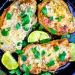 Chicken breasts cooked with lemon and parsley.