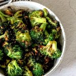 Roasted broccoli with a keto-friendly fork.