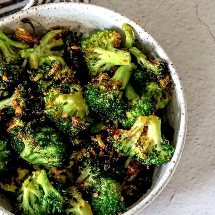 Roasted broccoli with a keto-friendly fork.