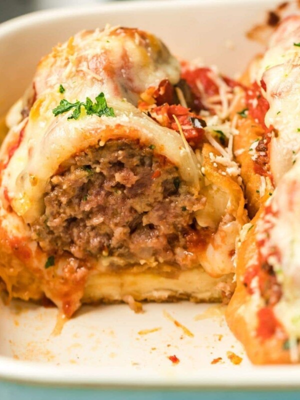 Meatloaf with cheese and sauce cooked in a meatball sub bake.
