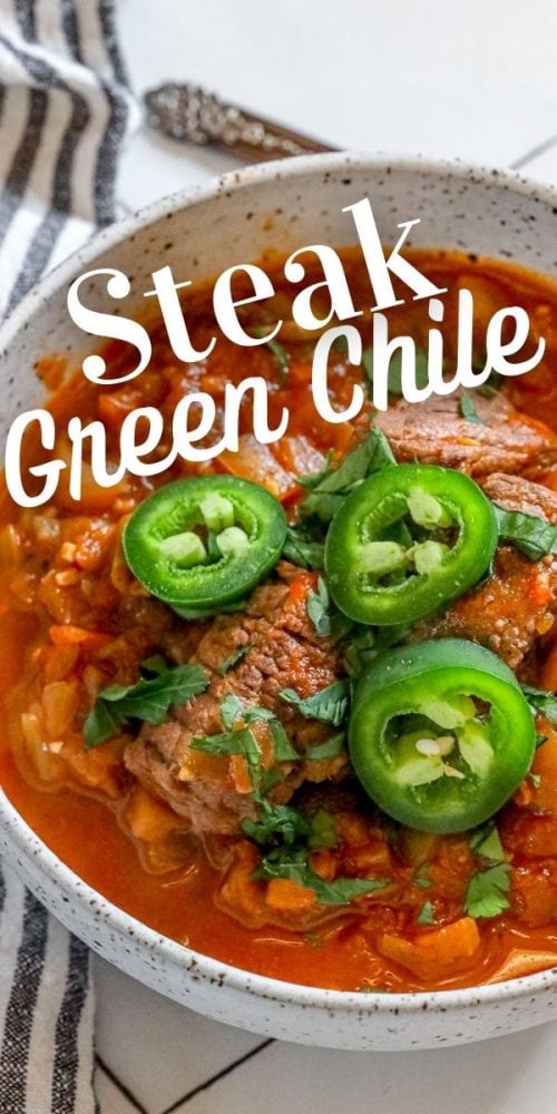 beef green chile with sliced jalapenos and chopped cilantro in a bowl 