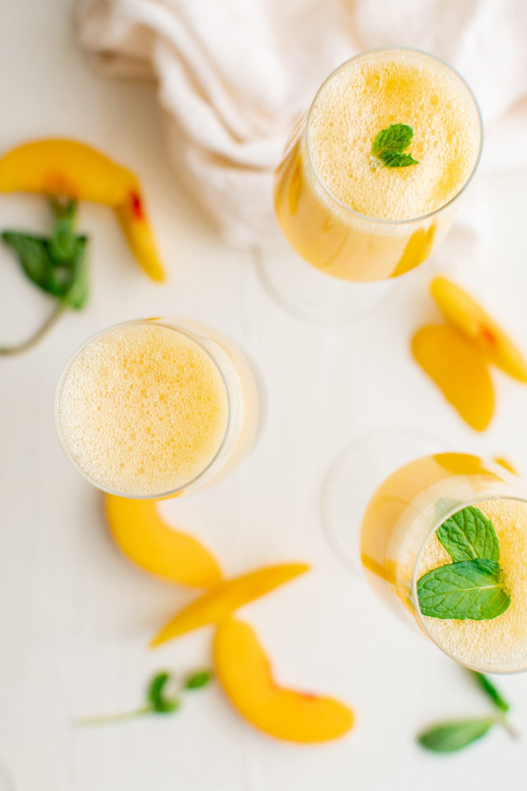 picture of peach bellinis in a champagne glass