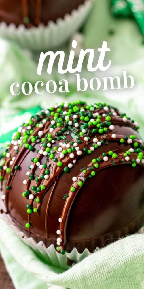 chocolate spheres drizzled in chocolate with green sprinkles. 