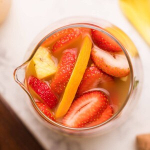 An easy recipe for fruity sangria with strawberries and bananas.