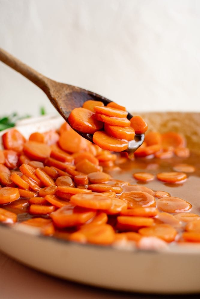 picture of glazed carrots in a white bowl 