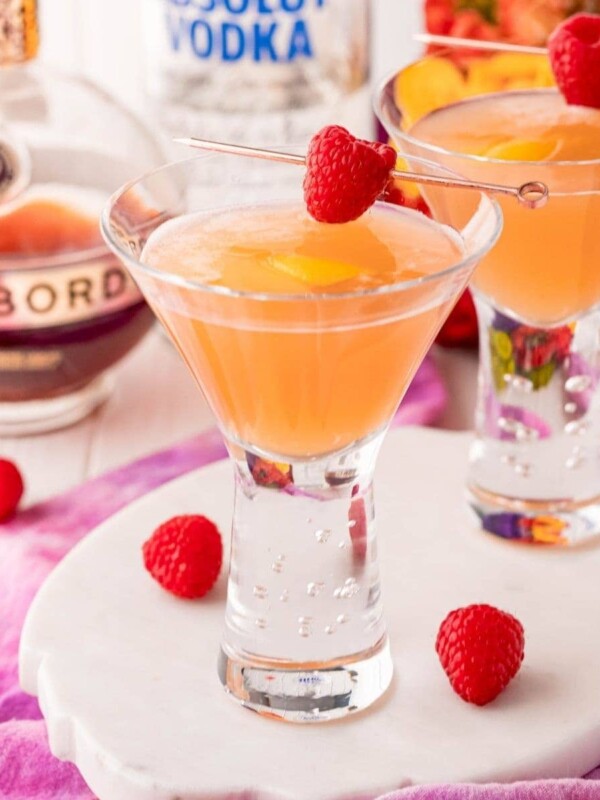 french martinis in a glass with a raspberry