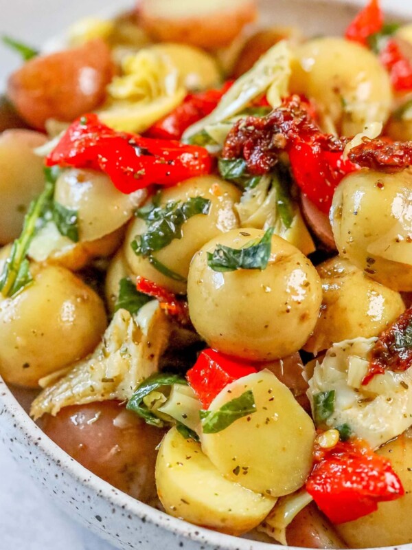 A vegan Italian potato salad recipe with red peppers and onions.
