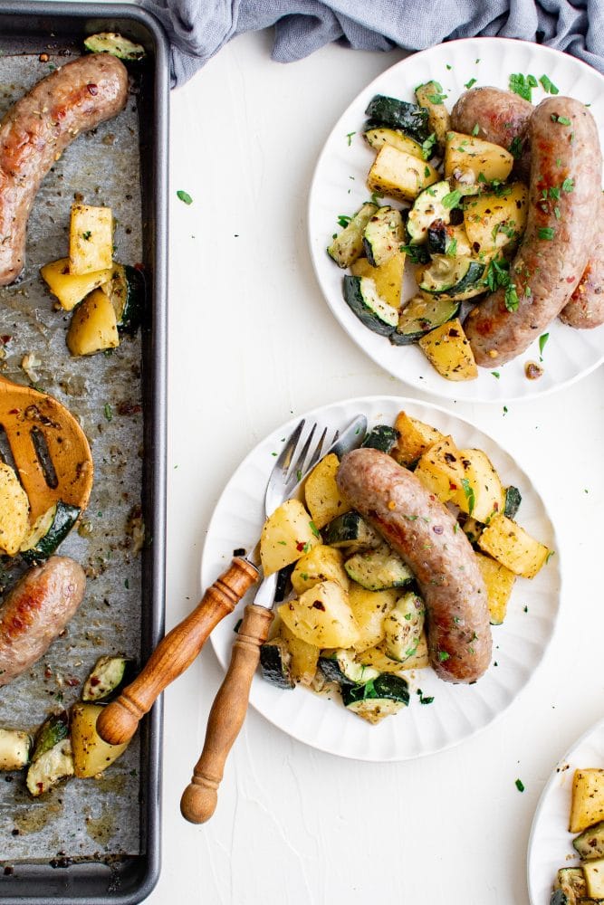 picture of sausage, potatoes, and zucchini on a plate