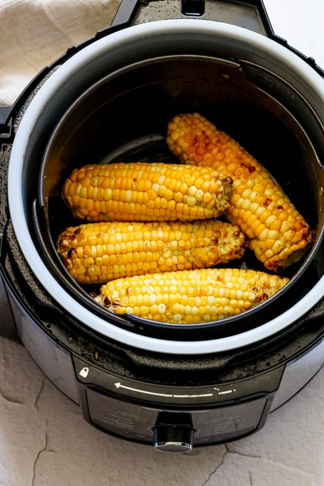 fried ears of corn in an air fryer