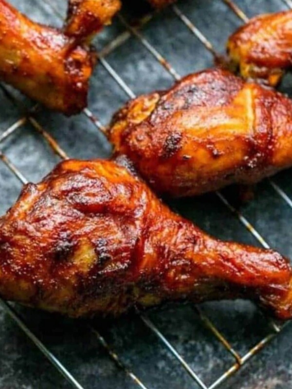 picture of bbq baked chicken leg on a baking sheet