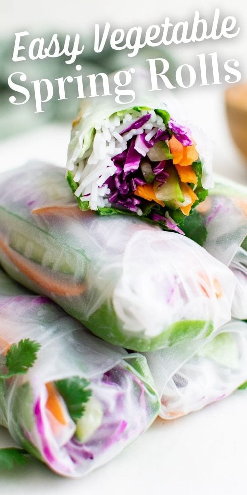 spring roll wrapper with noodles, cabbage, rice, lettuce, and cucumber