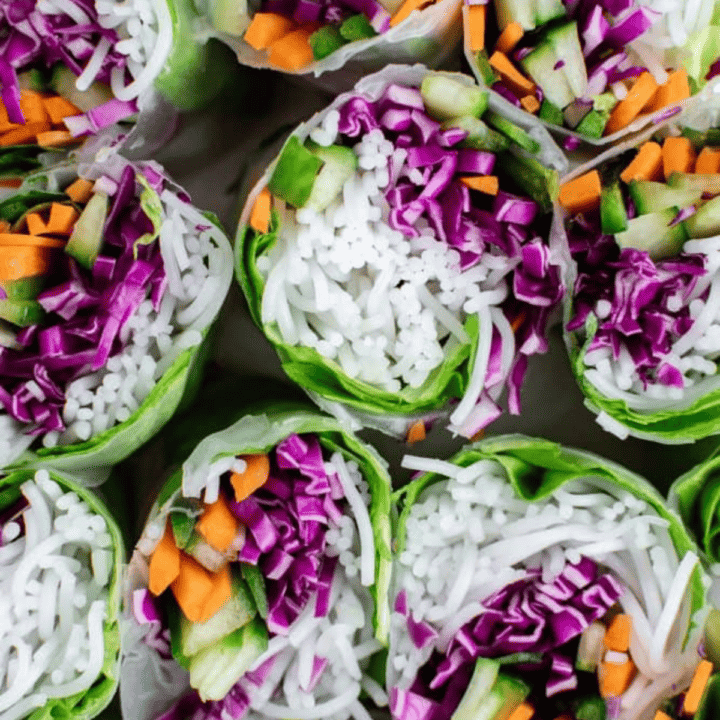 Vegan Vietnamese spring rolls filled with cabbage, carrots, and scallions.