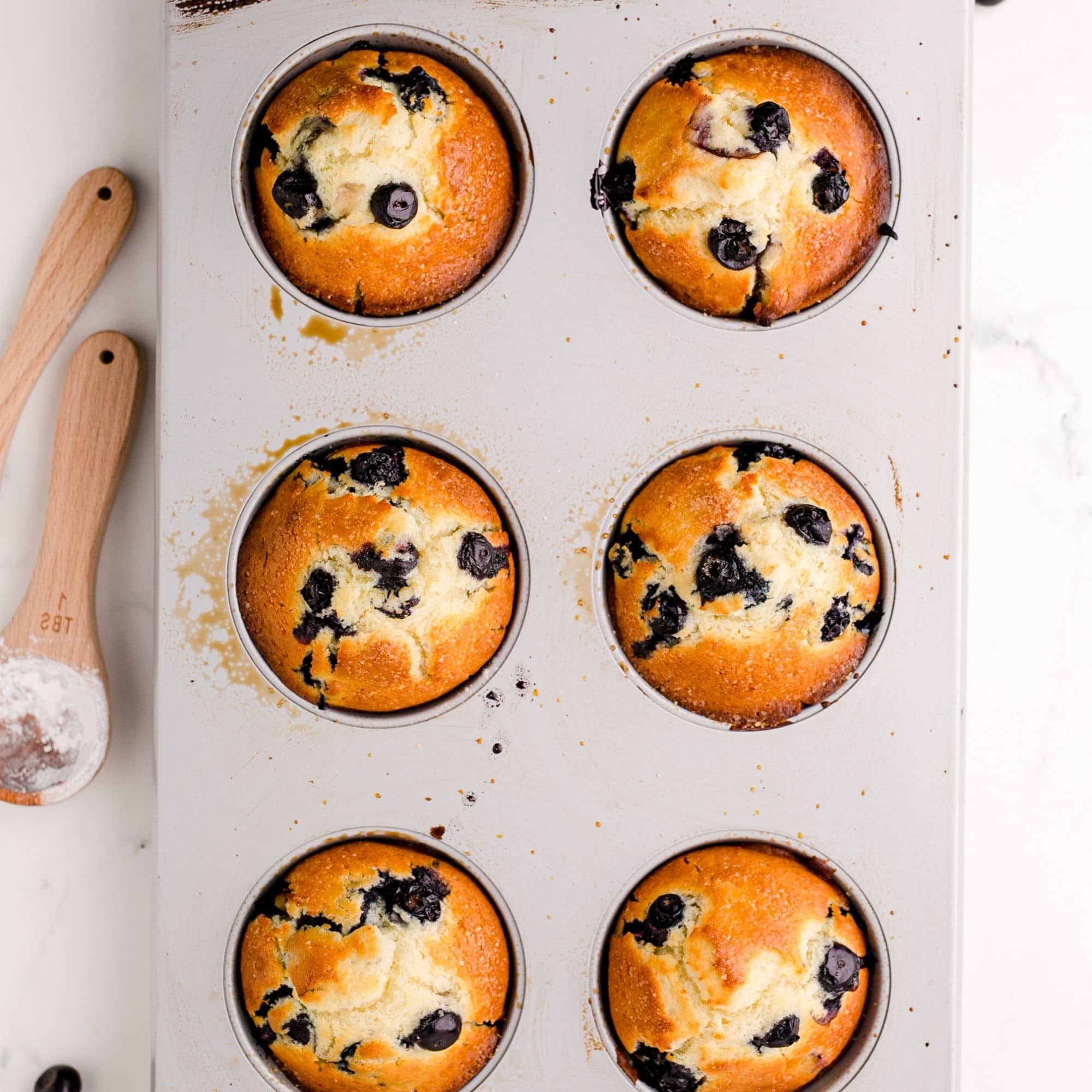 Blueberry muffins recipe in a jumbo muffin tin.