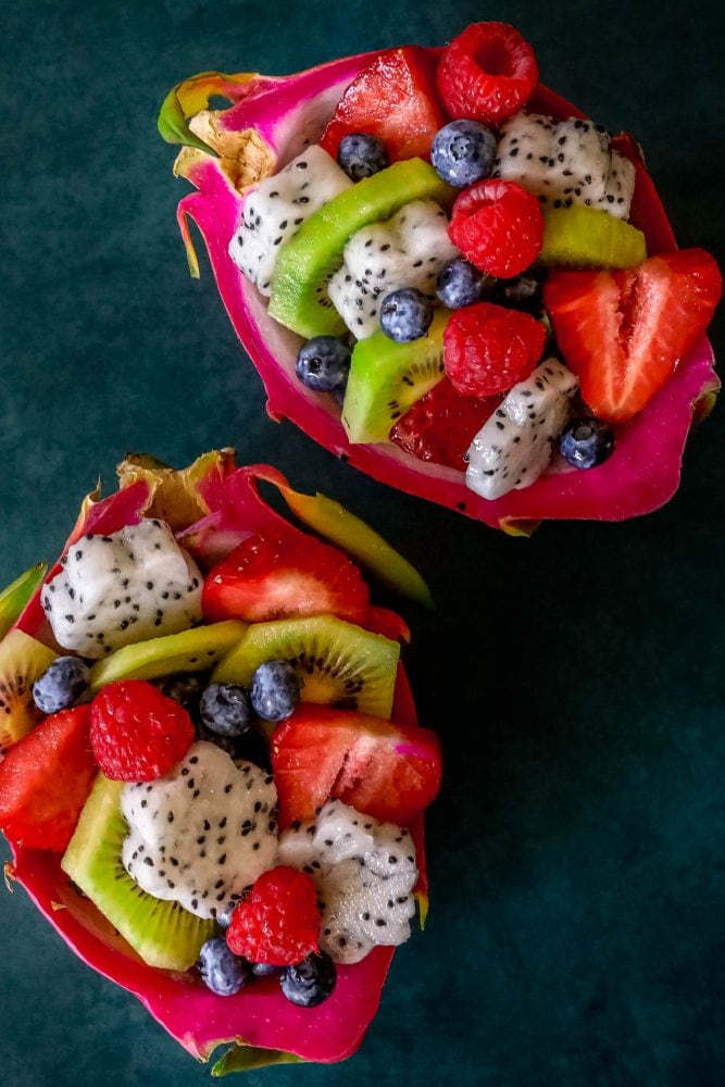 picture of diced fruit salad in a carved out dragon fruit hull