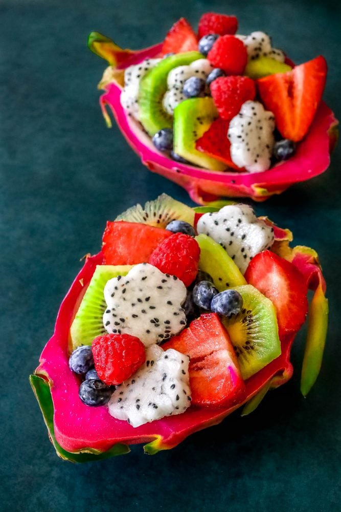 picture of diced fruit salad in a carved out dragon fruit hull