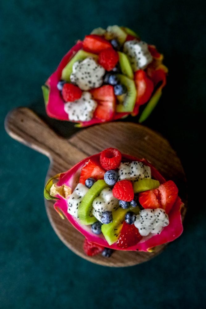 picture of diced fruit salad in a carved out dragon fruit hull