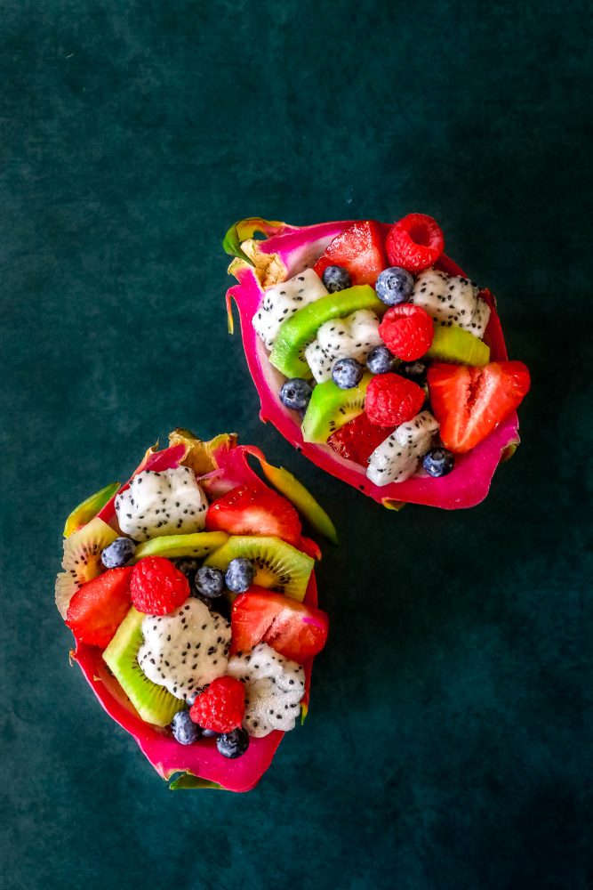picture of diced fruit salad in a carved out dragon fruit hull
