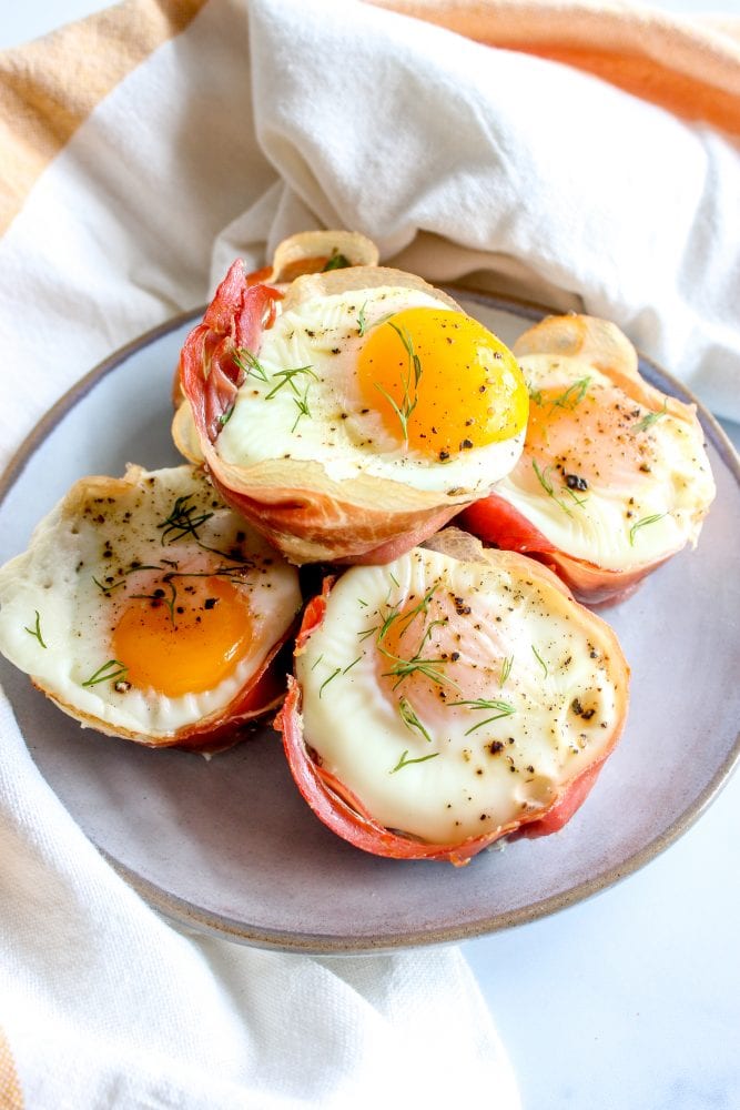 Over-Easy Eggs in Prosciutto Cups - Sweet Savory and Steph