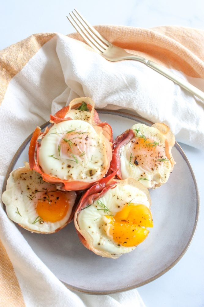 Over-Easy Eggs in Prosciutto Cups - Sweet Savory and Steph