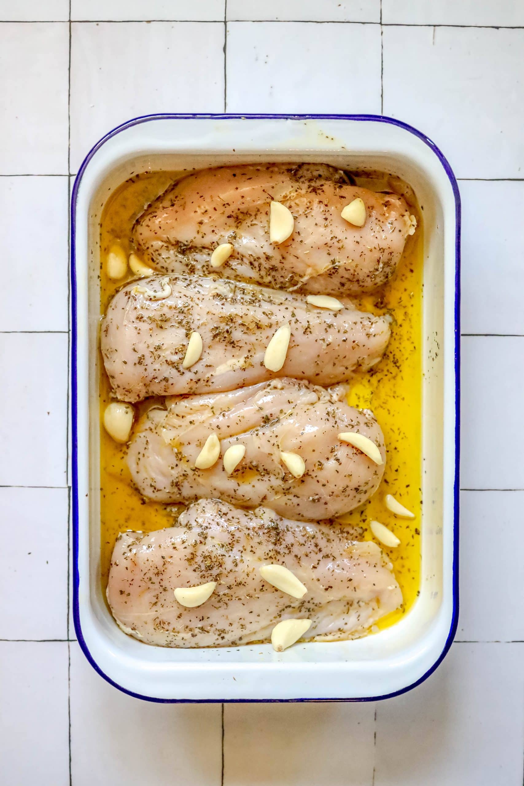 Baked chicken breasts with garlic and almonds.