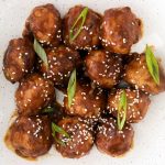Asian meatballs with sesame seeds.