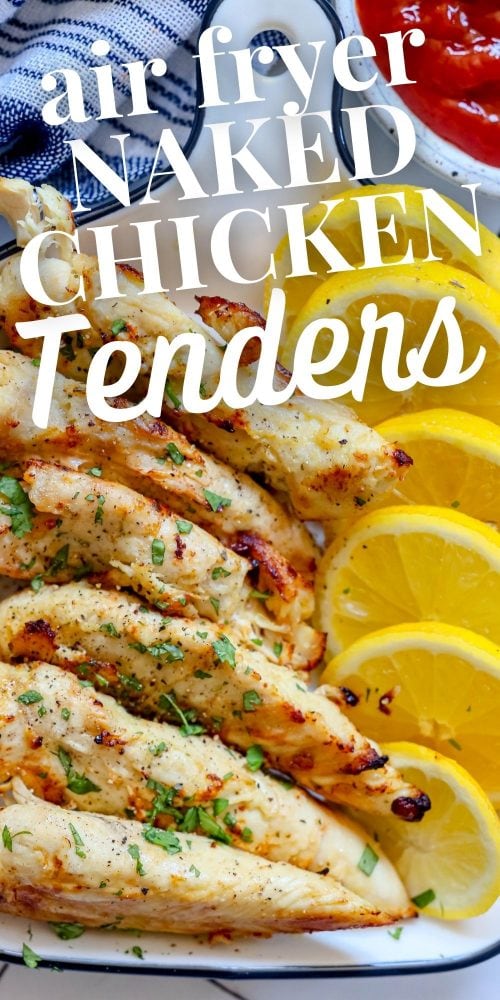 picture of naked chicken tenders in a white dish with lemon slices next to them