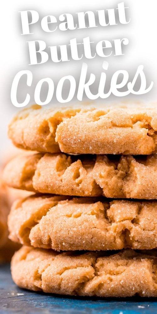 picture of peanut butter cookies stacked on a blue table