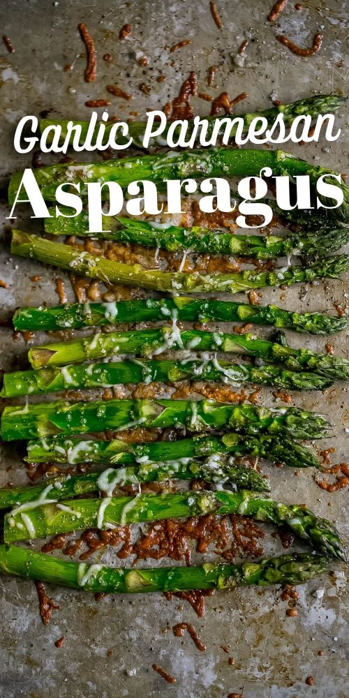 roasted asparagus with parmesan cheese on baking sheet 