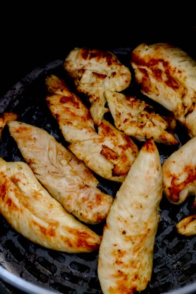 unbreaded chicken tenders in an air fryer
