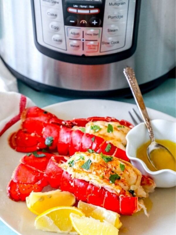 Instant Pot recipe with lobster tails and lemons.