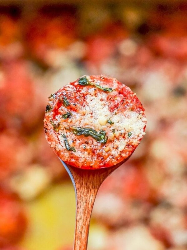 picture of roasted tomato on a wooden spoon