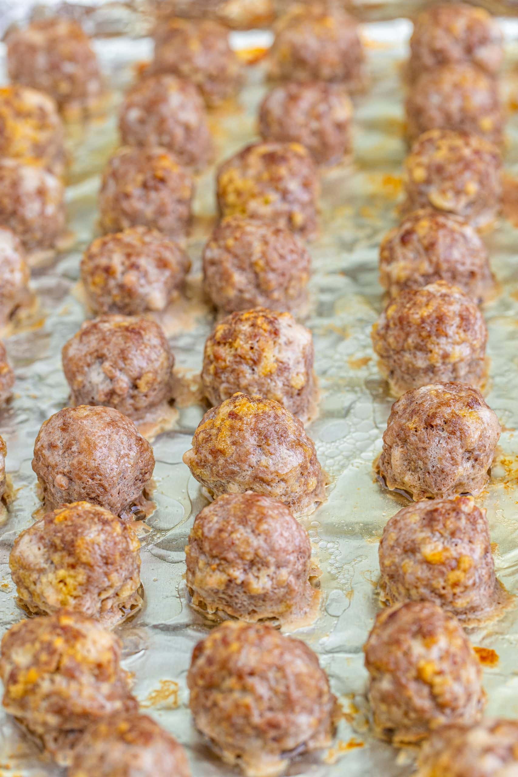 picture of baked meatballs on a baking sheet