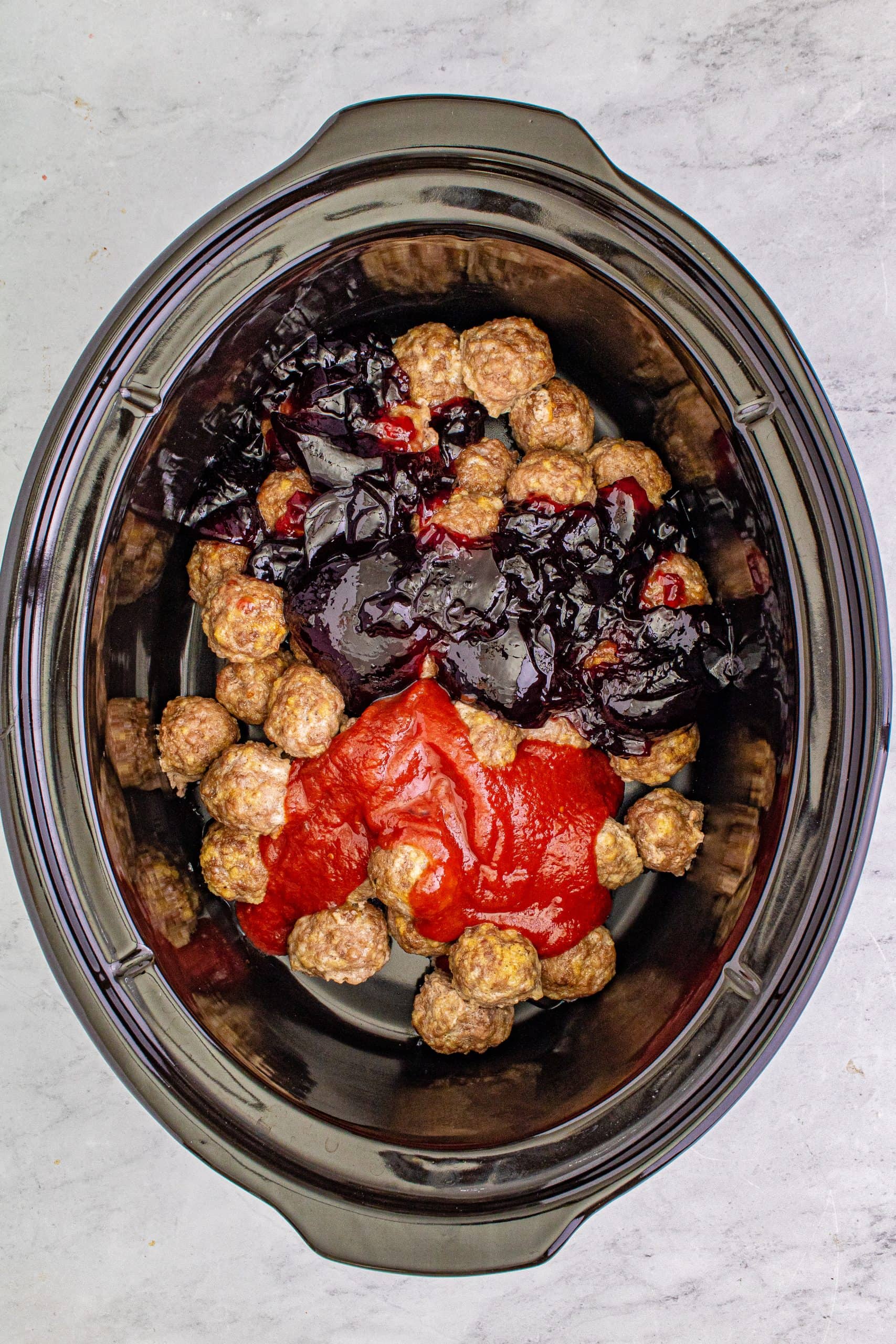 picture of meatballs and sauce in a slow cooker
