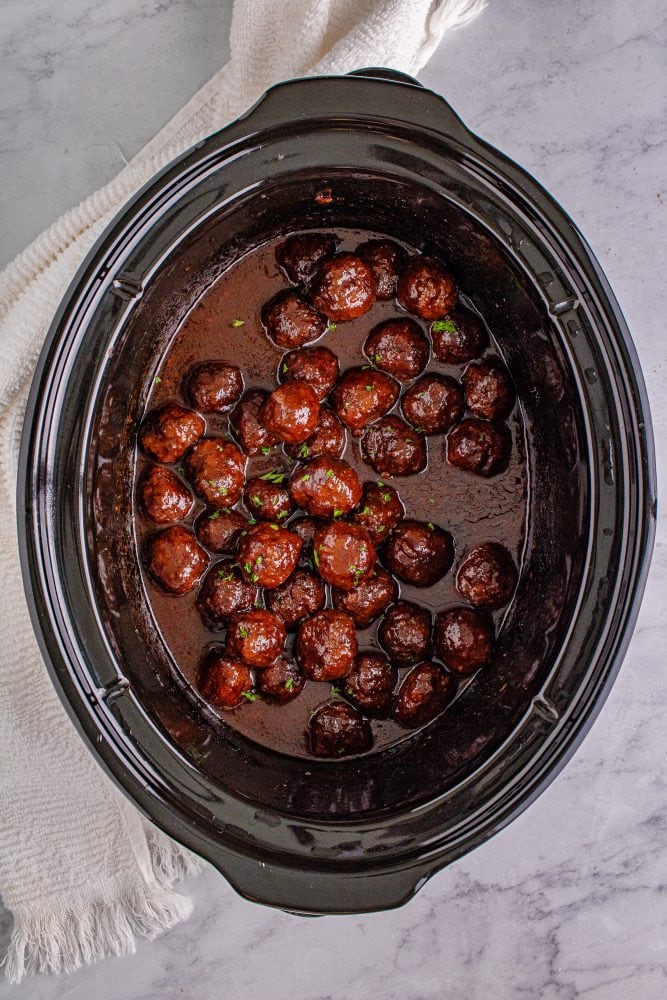 picture of grape jelly meatballs in a slow cooker