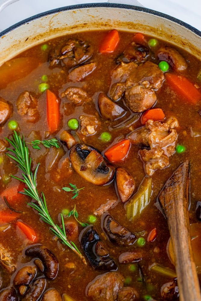 picture of venison stew in a dutch oven